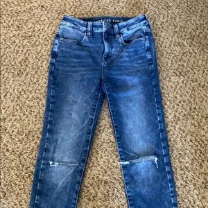 high rise stretchy slit knee jeans